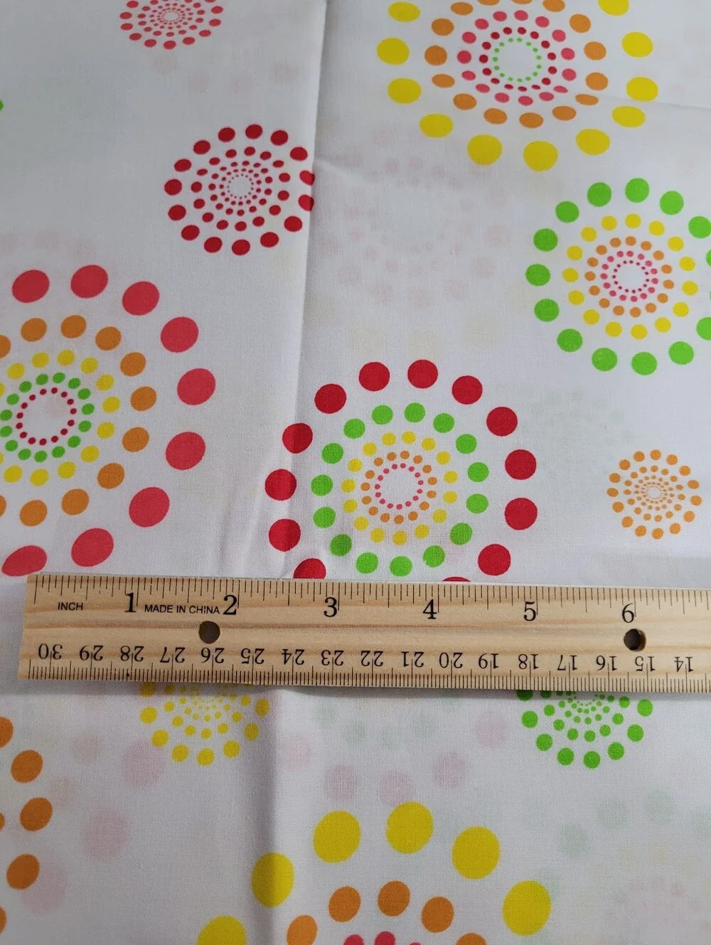 Spring Industries White Sewing Fabric with Colorful Dot Burst Pattern (1519)